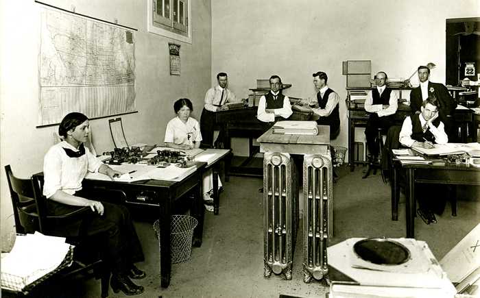 Office Workers Seated at Desks