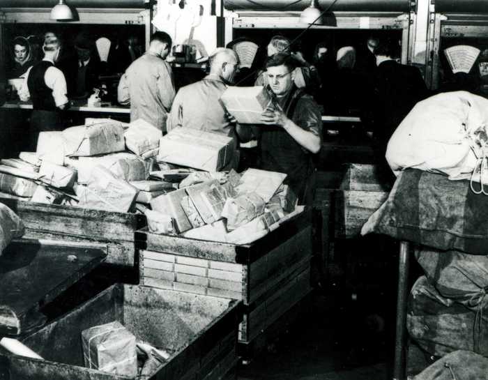 Sorting Parcels Behind Counter