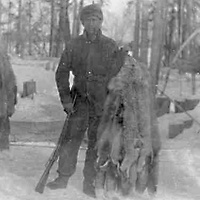 A fur trapper with his catch. near Fort Resolution, NWT